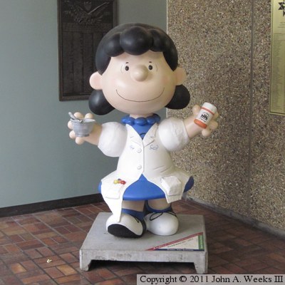 Peanuts On Parade - Looking For Lucy - Pharmacist Lucy